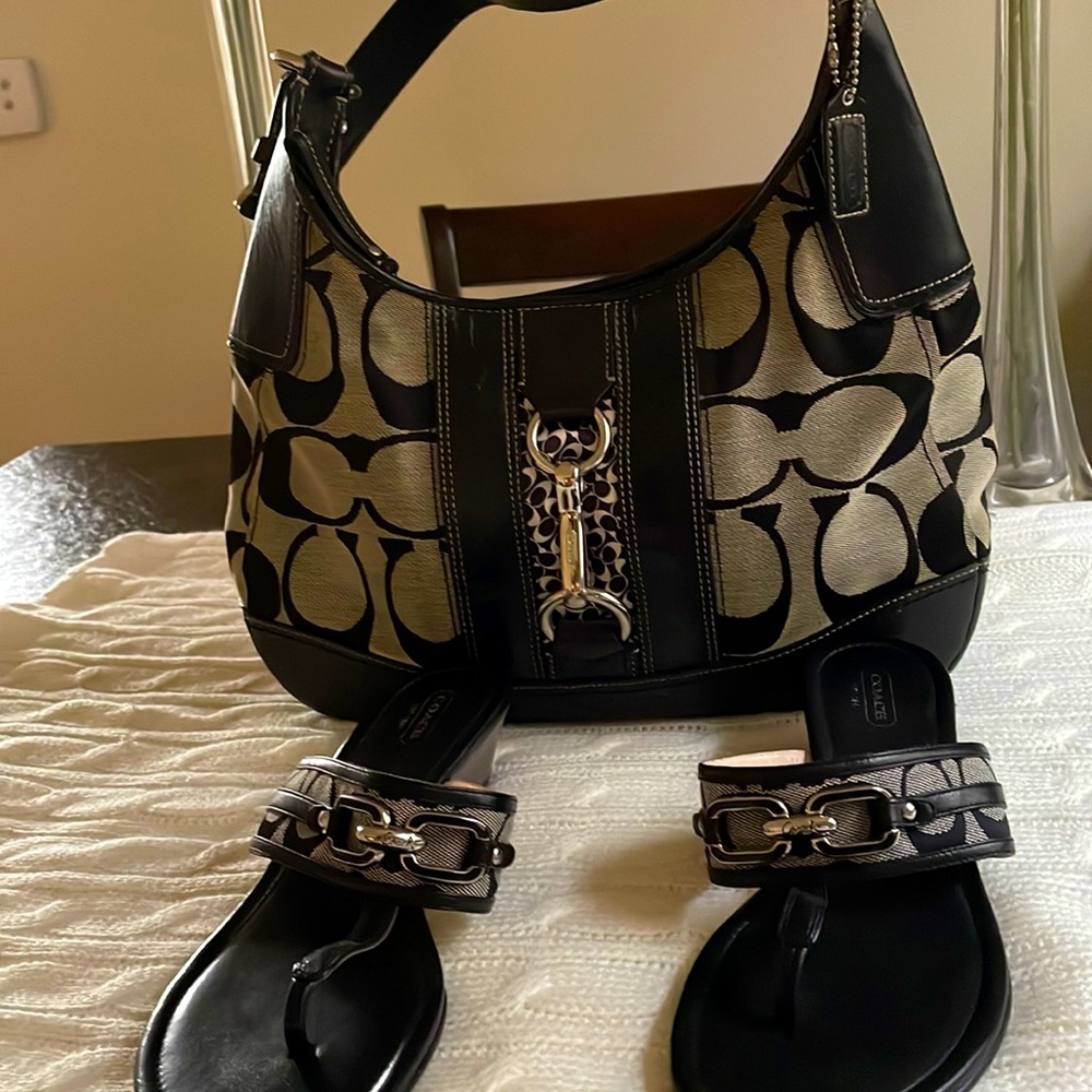 Coach handbag in good condition black and white leather care about 10 years